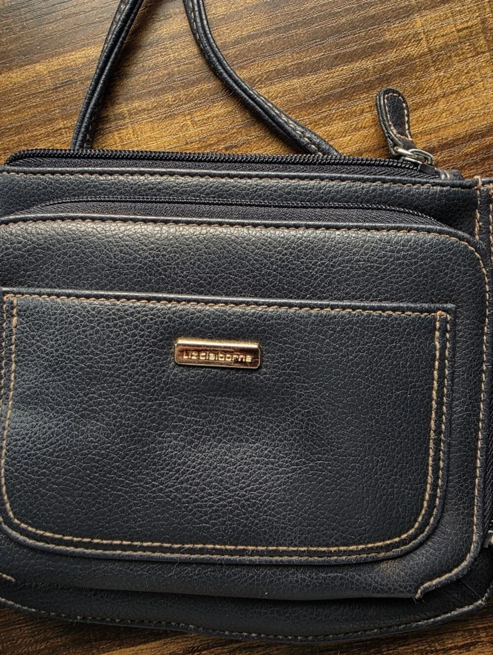 Compact Navy Crossbody with Front Pocket and Gold Accent